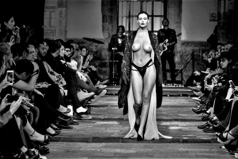 Naked fashion model on the catwalk