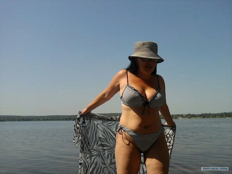 Mature Russian red in a swimsuit