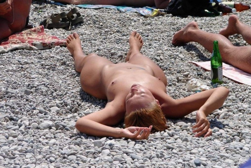 Naked drunk women on the beach