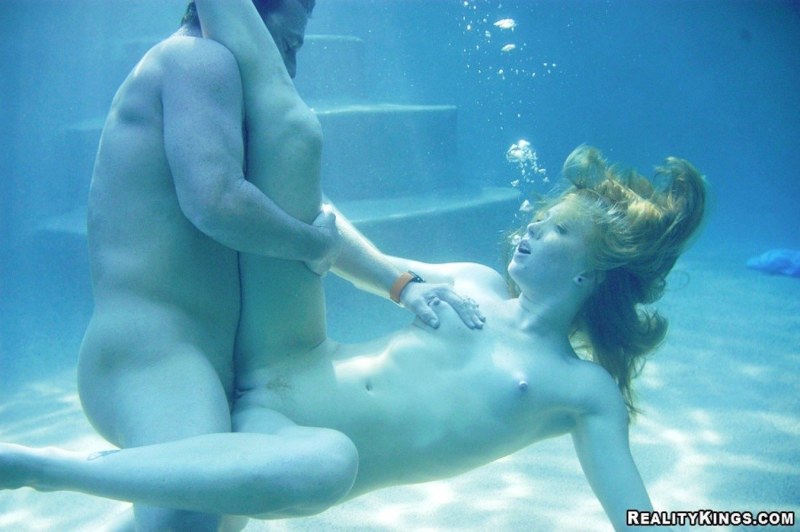 Nikky Thorne under water with porn  scuba gear