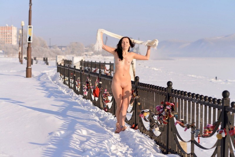 Naked women in the winter on the street