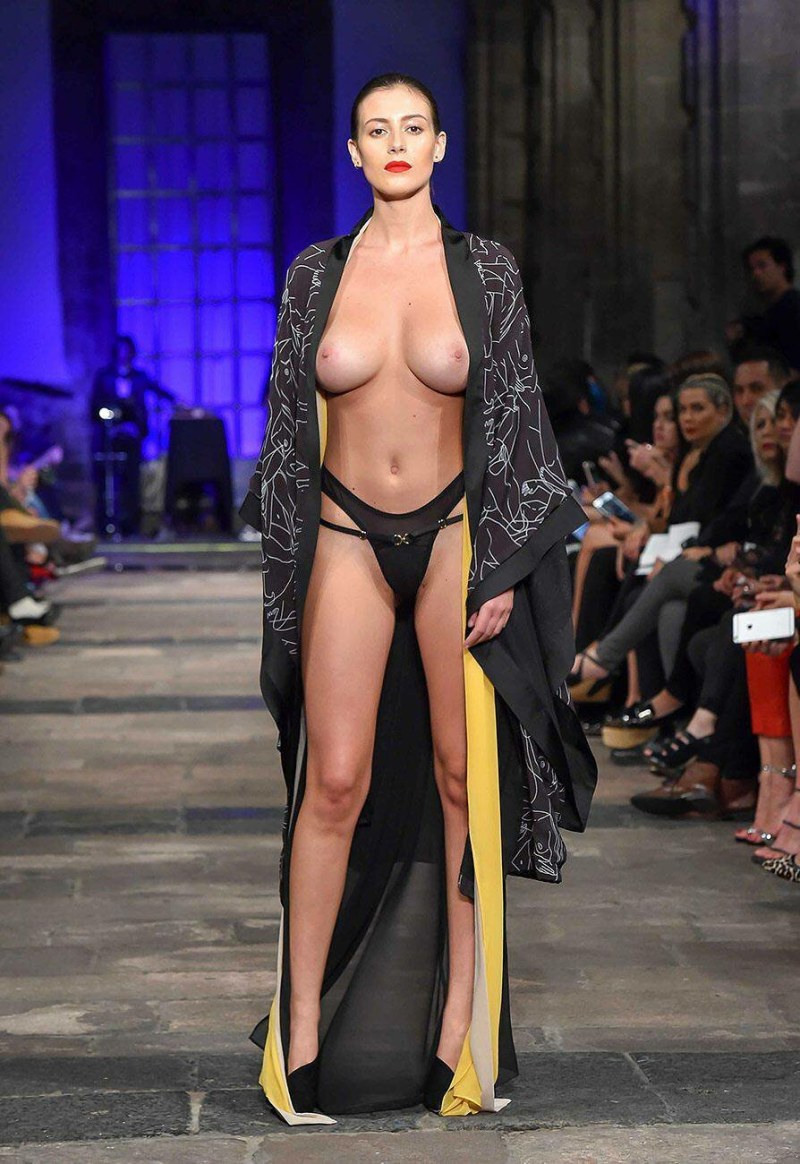 Naked fashion model on the catwalk