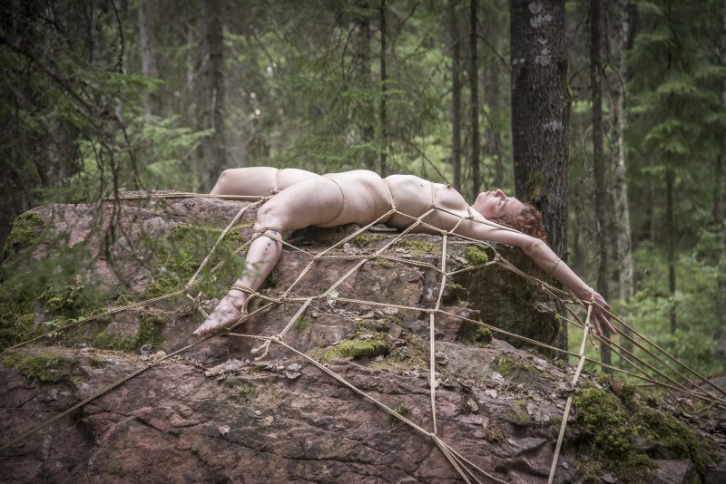 A tied naked woman