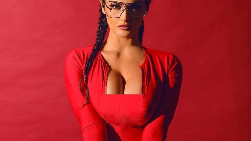 Girl in a red dress breast