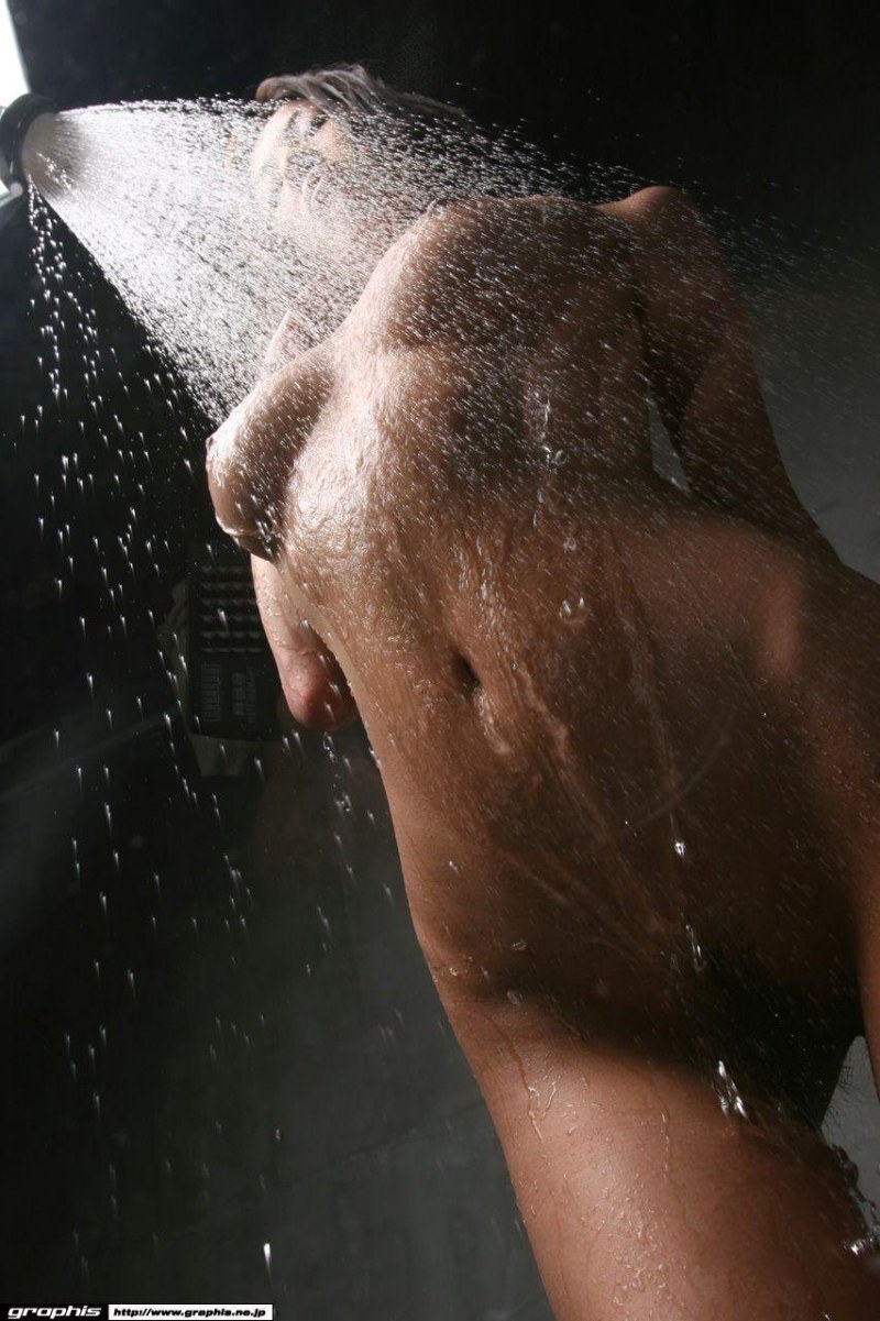 Beautiful brunette in the shower naked