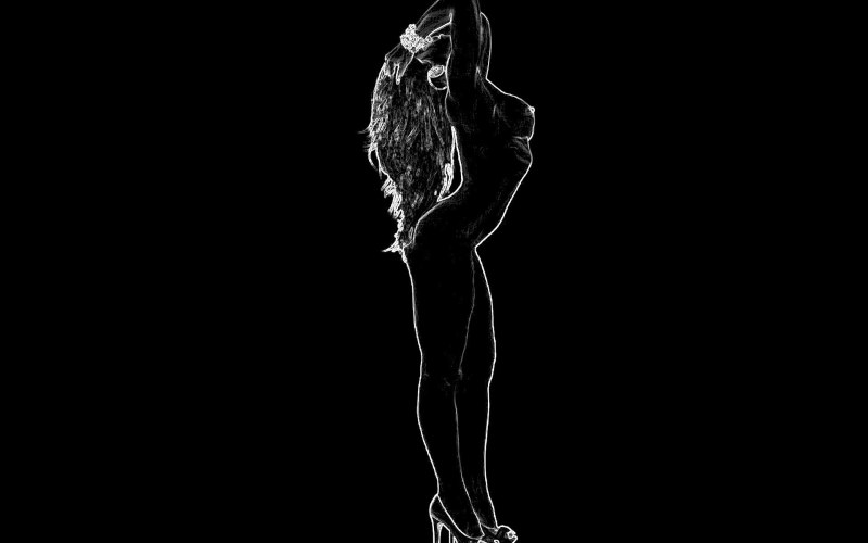 Female silhouette on a dark background