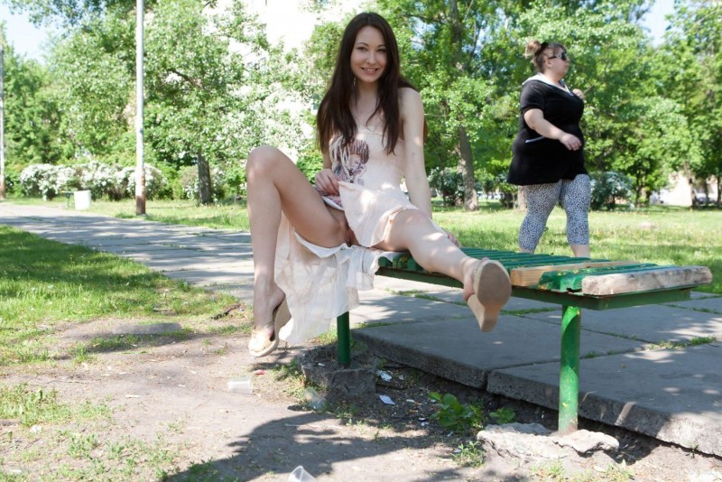 Girl without panties walks in the park