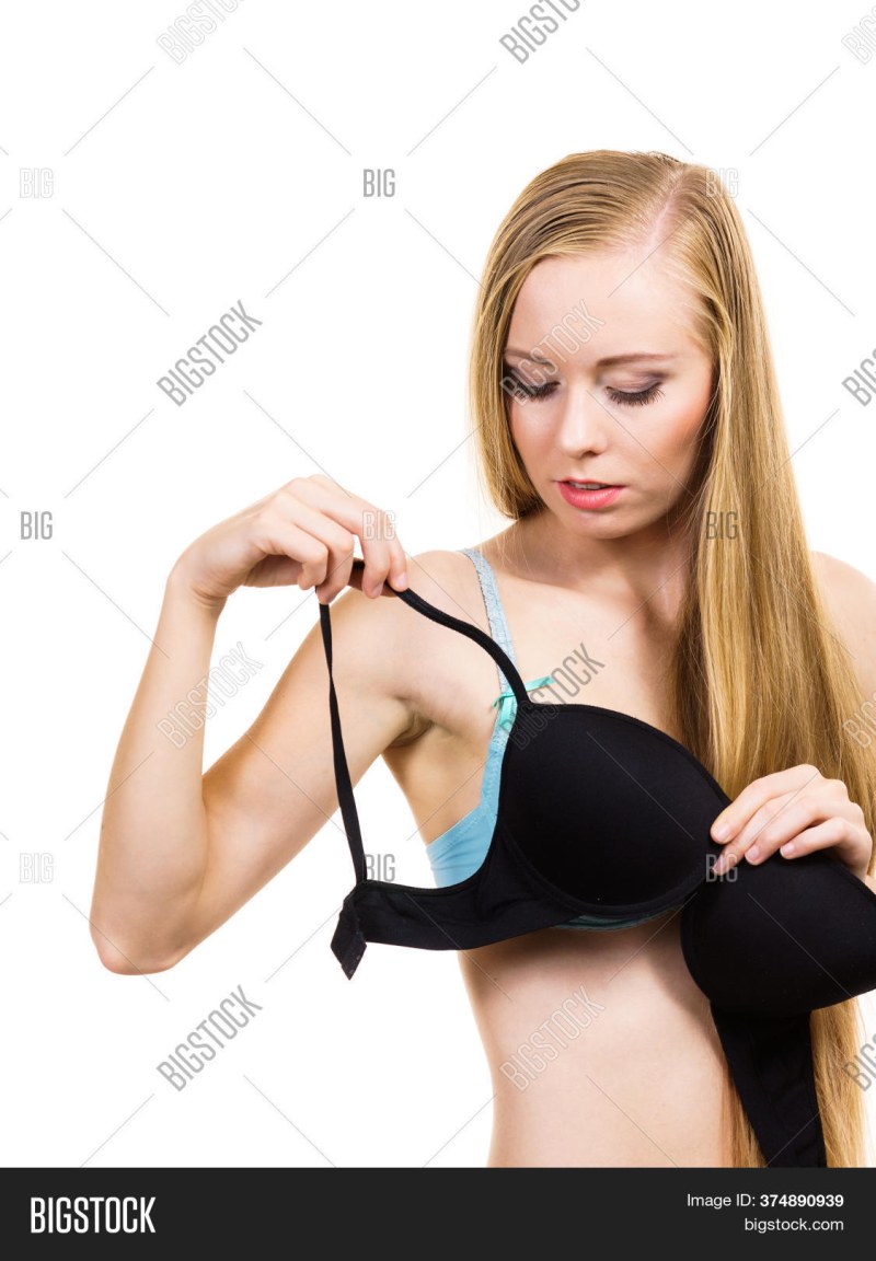 A man unfasten a bra for a woman