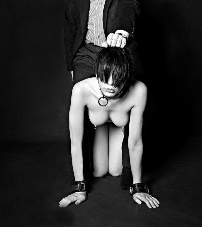 The submissive girl is a slave