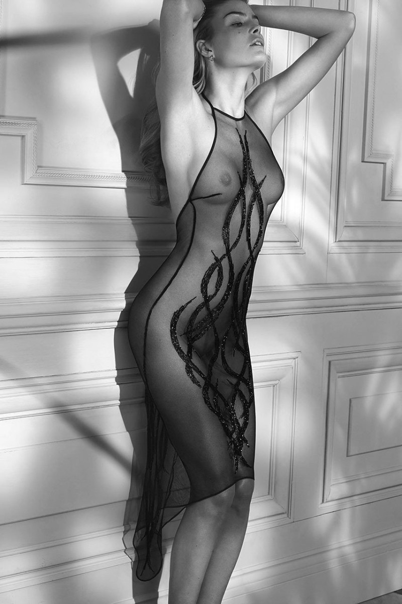 Woman in a blouse without panties