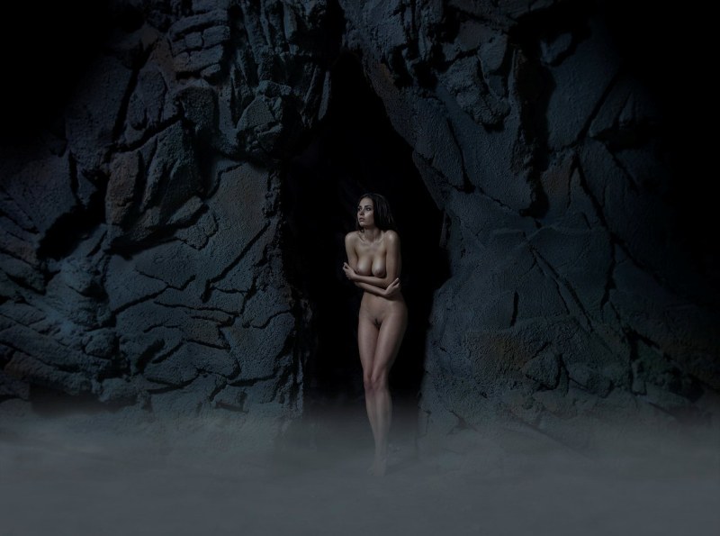 Naked in a cave