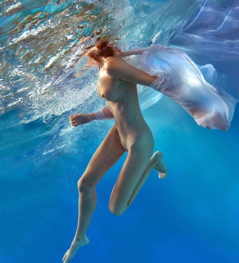 Naked girls in water