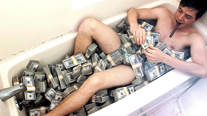 Man bathes in money