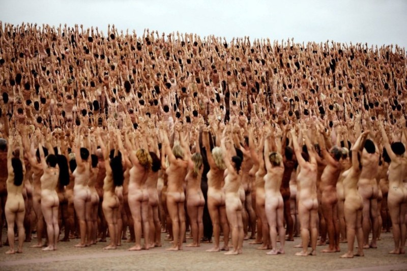 Naked men and women together