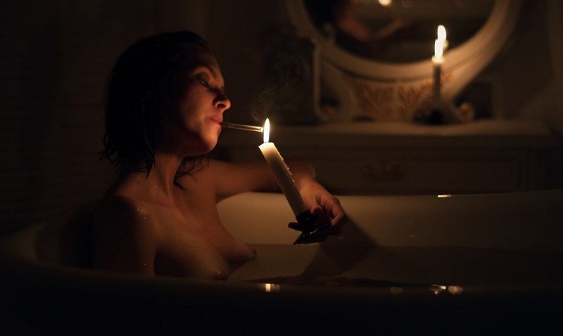 Erotic photo shoot with candles