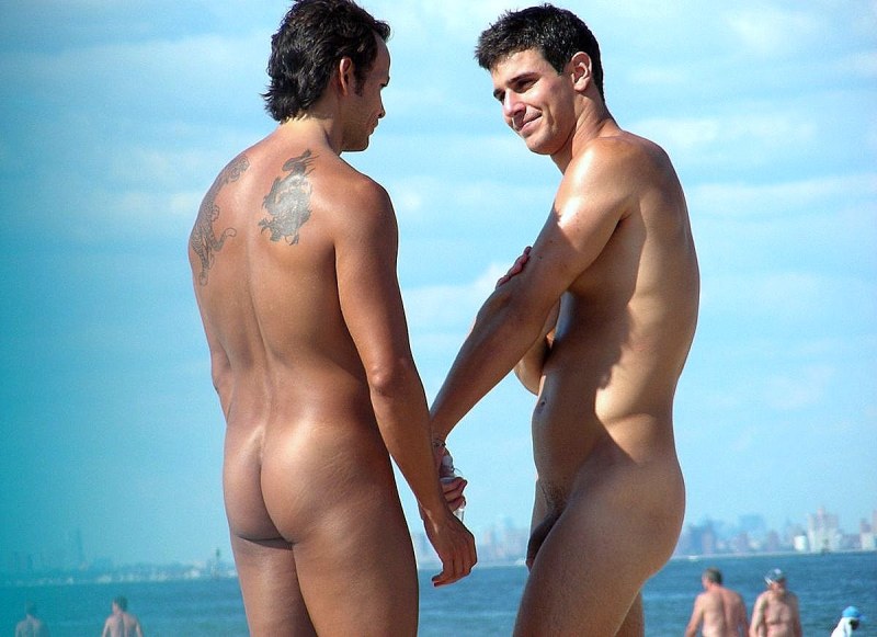Naked young guys on the beach