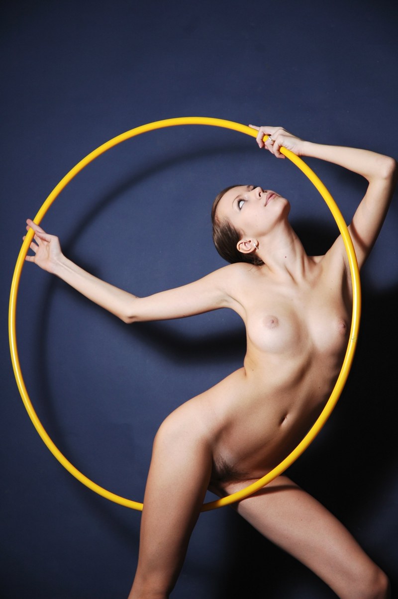 Naked beauty with a hoop