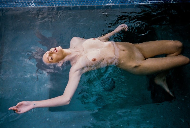 Naked female priests in the pool