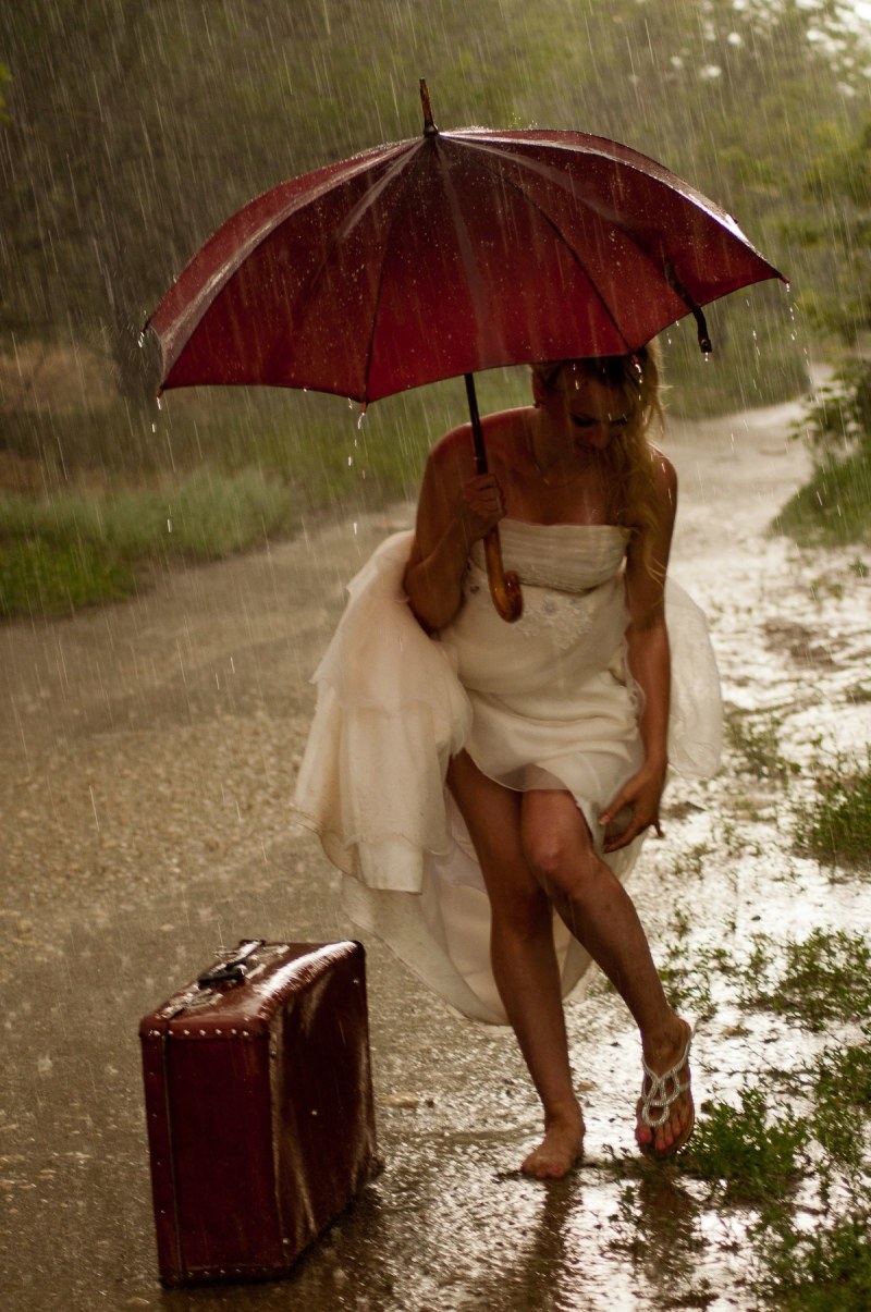 Girl in linen in the rain