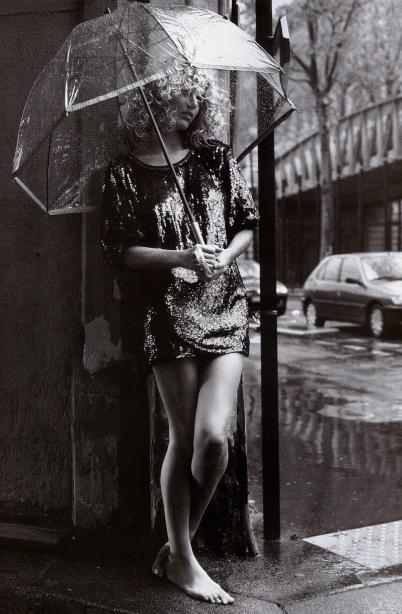 The girl is in the rain