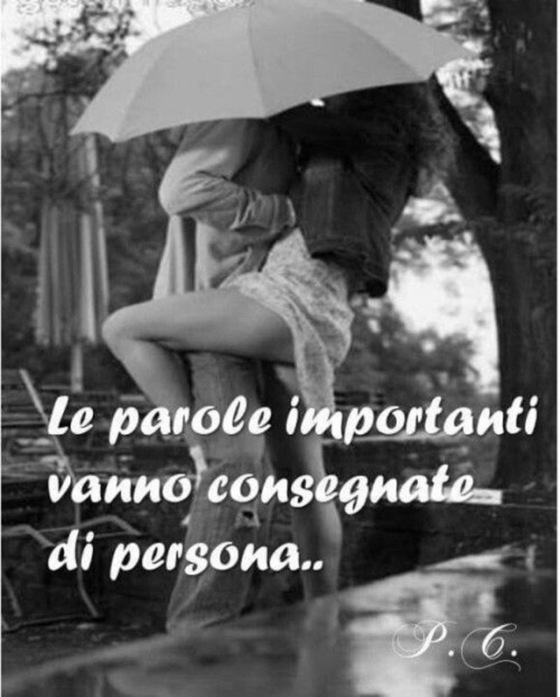 A guy with a girl under an umbrella