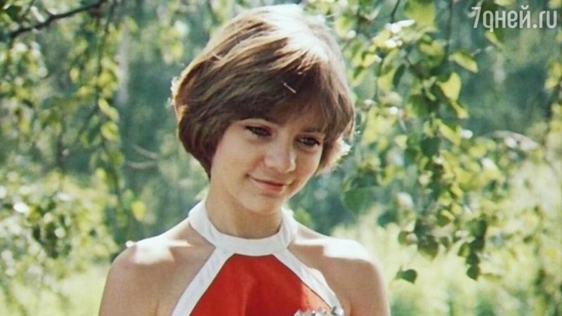 Girl with a car in the desert