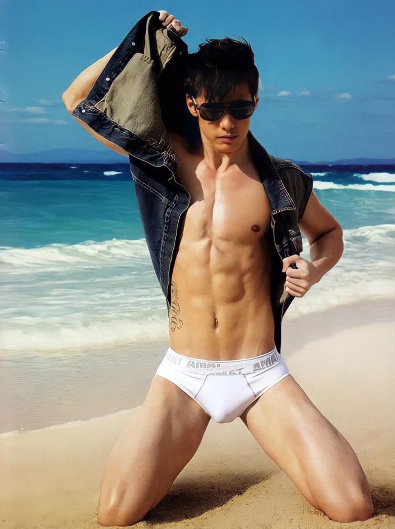 Young men in swimming trunks