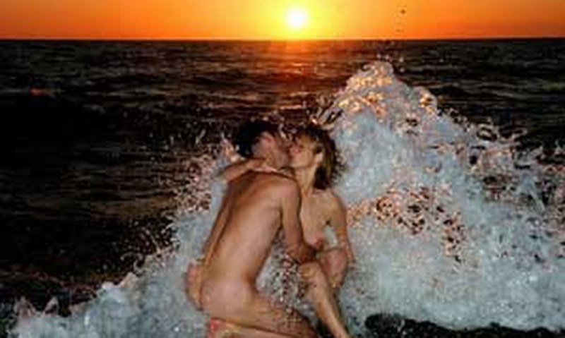 Beautiful naked pairs on the beach