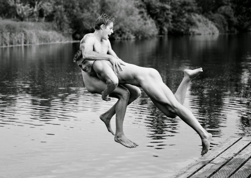 Naked man and woman in water
