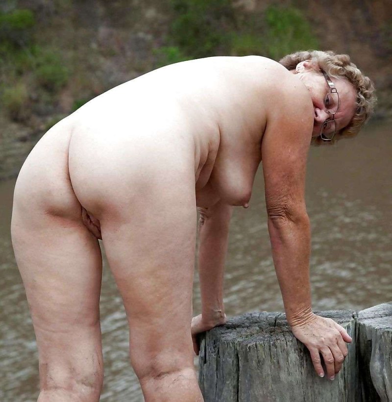 The elderly without panties on the beach