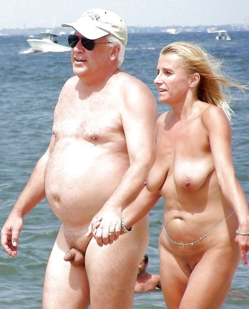 Naked girls fuck on the beach