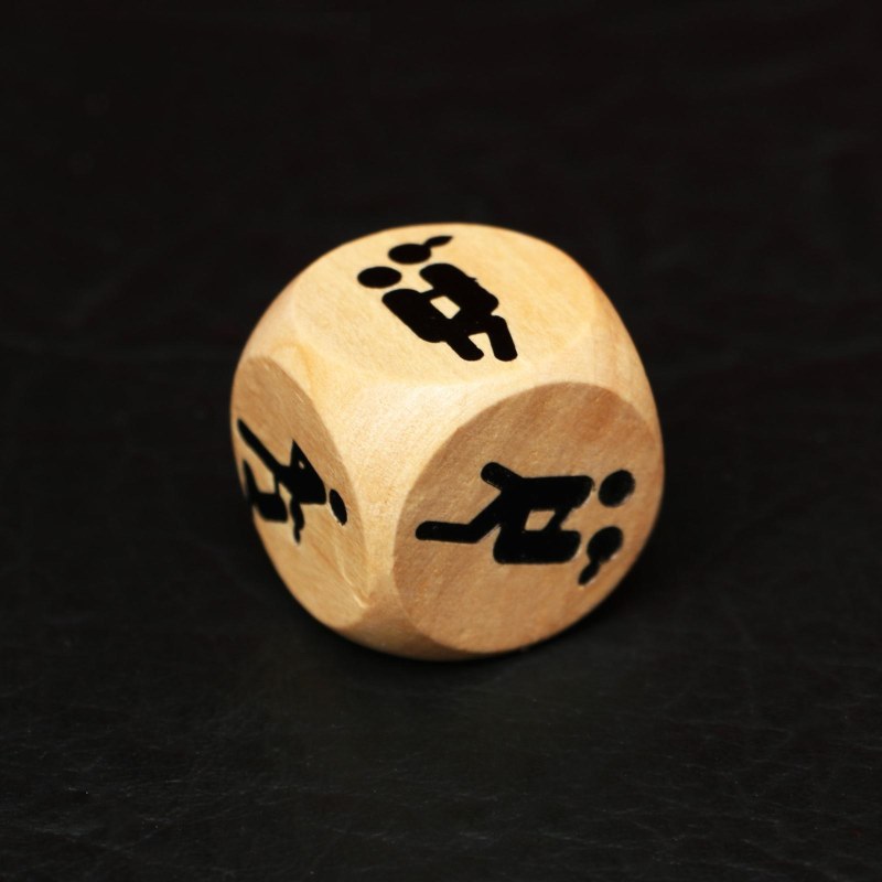 Wooden cube with poses