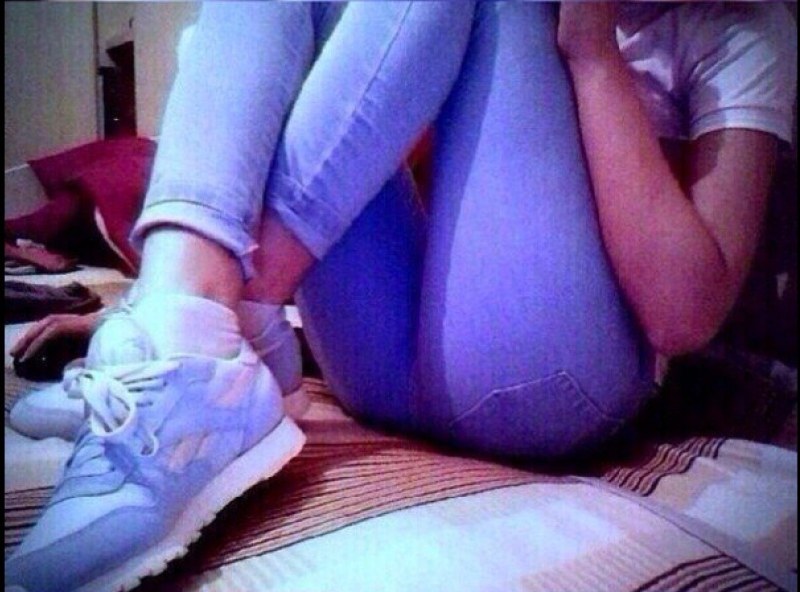 Girl with booty in sneakers