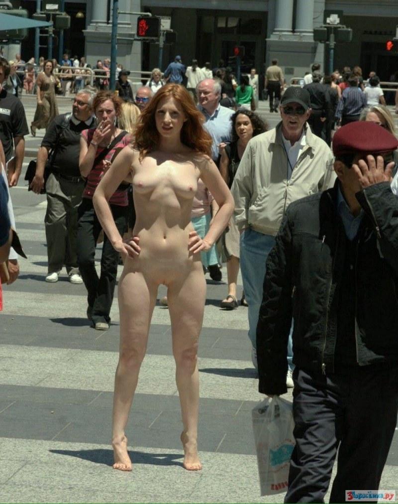 The girl undresses in public