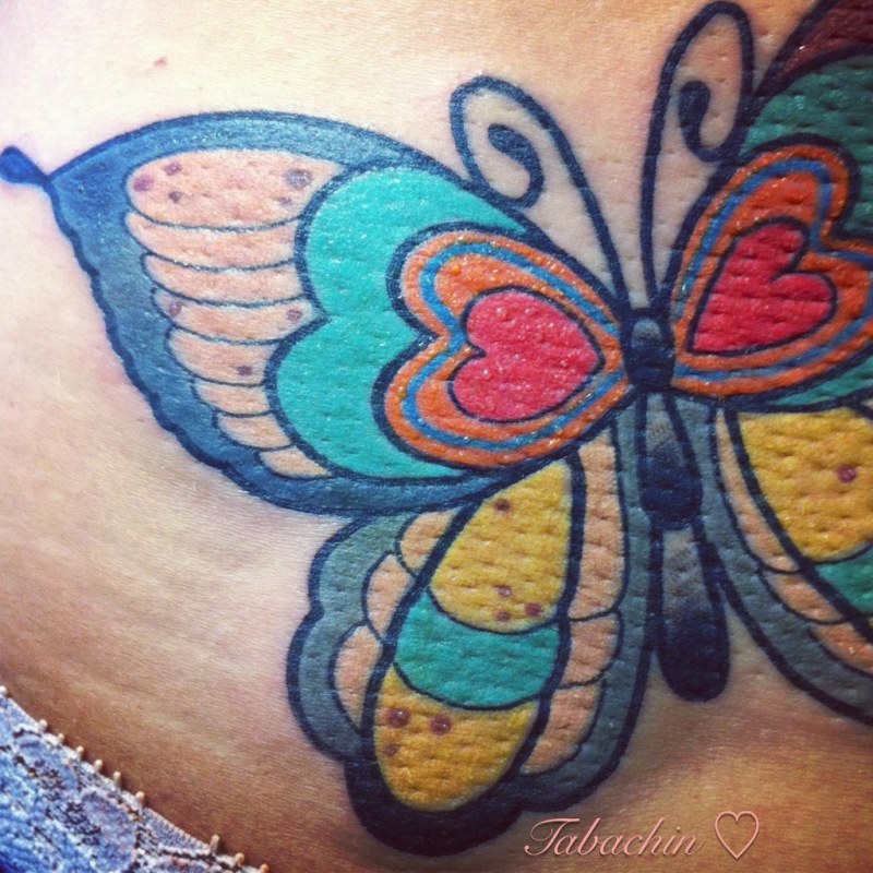 Tattoo butterfly on the intimate area