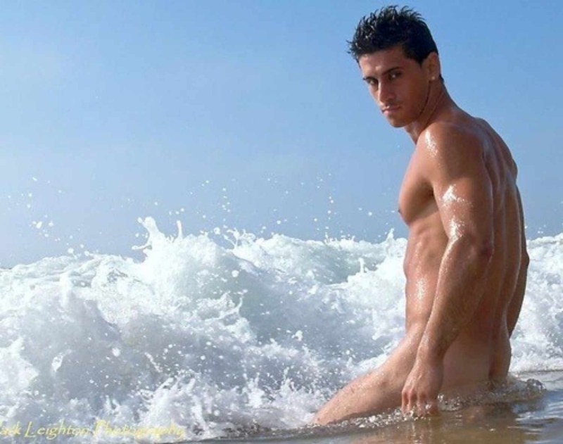 Naked photo shoot of men on the beach