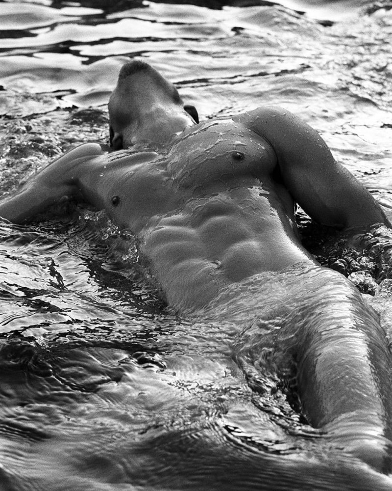 Beautiful naked guys at sea