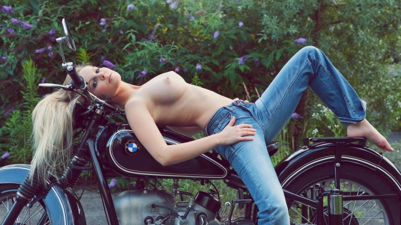 Naked girl on a motorcycle