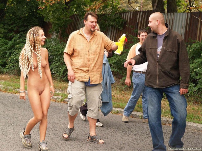 Naked women among dressed men