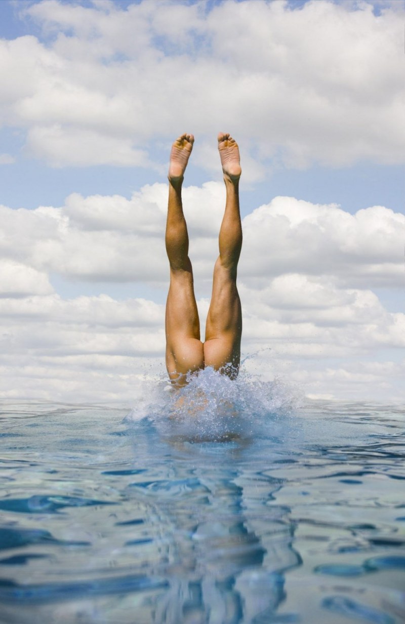 Girls jump into the water naked