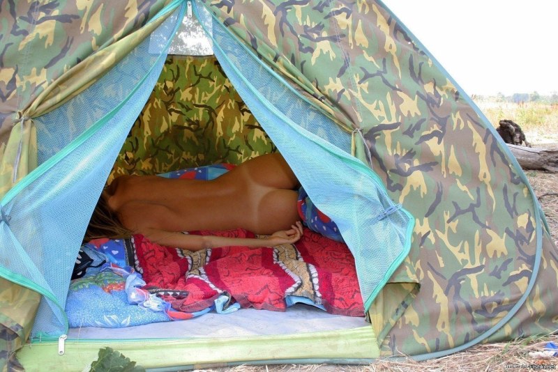 Naked girls in a tent