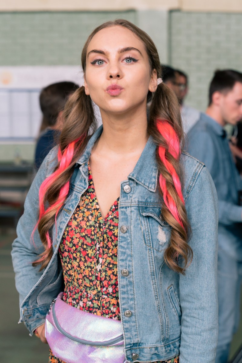 Daria Strokous in a skirt