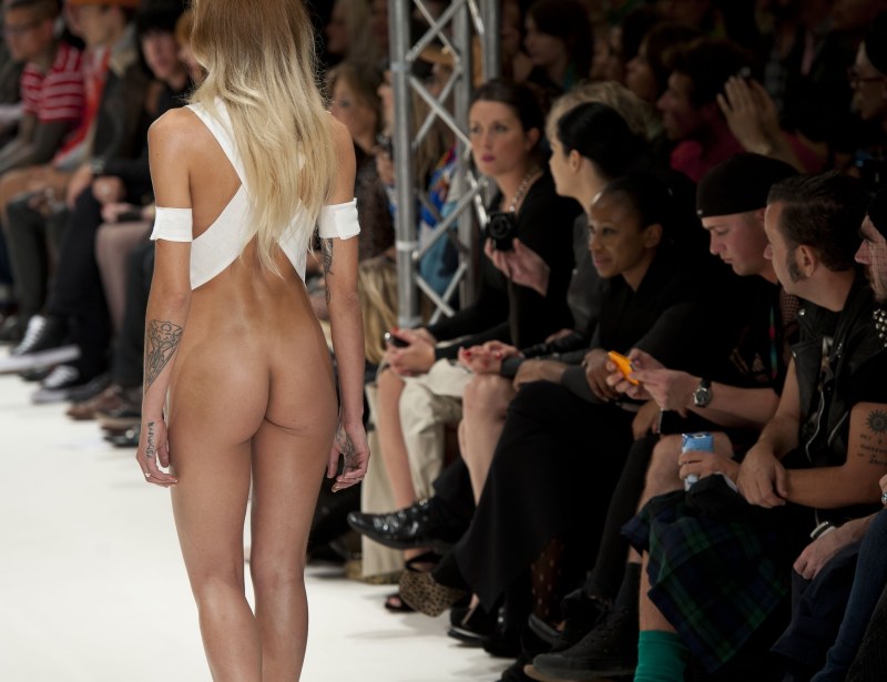 Naked fashion model on the catwalk