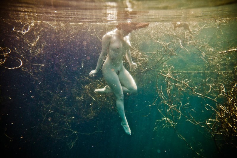Naked girls in transparent water