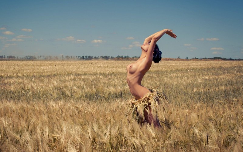 Beautiful naked girls in the meadow