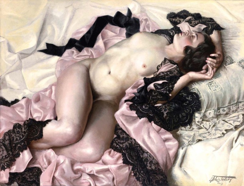 Girls topless in bed