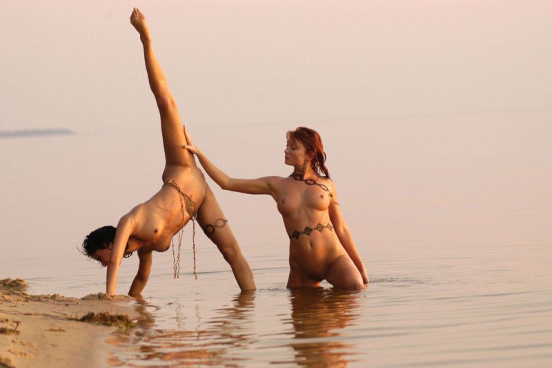 Naked dancing girls on the beach