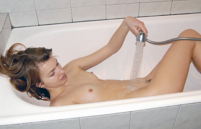 Girl with small breasts in a jacuzzi