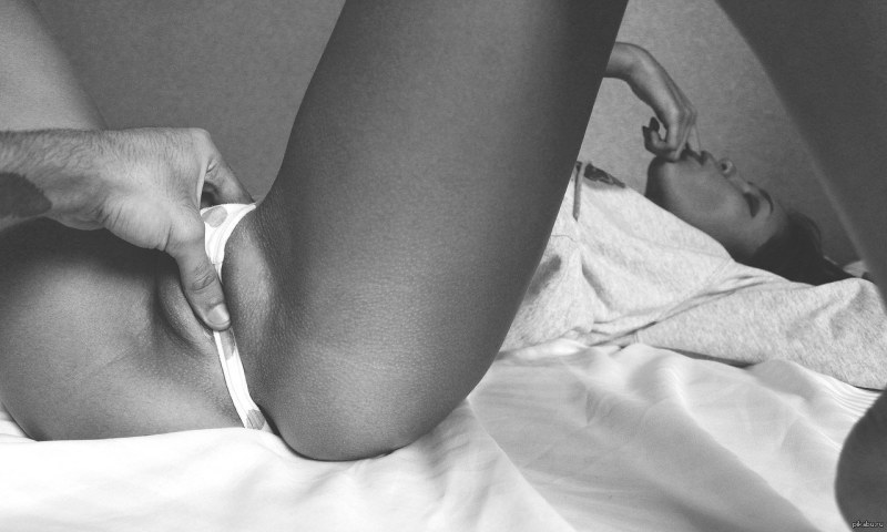 A man caresses a girl