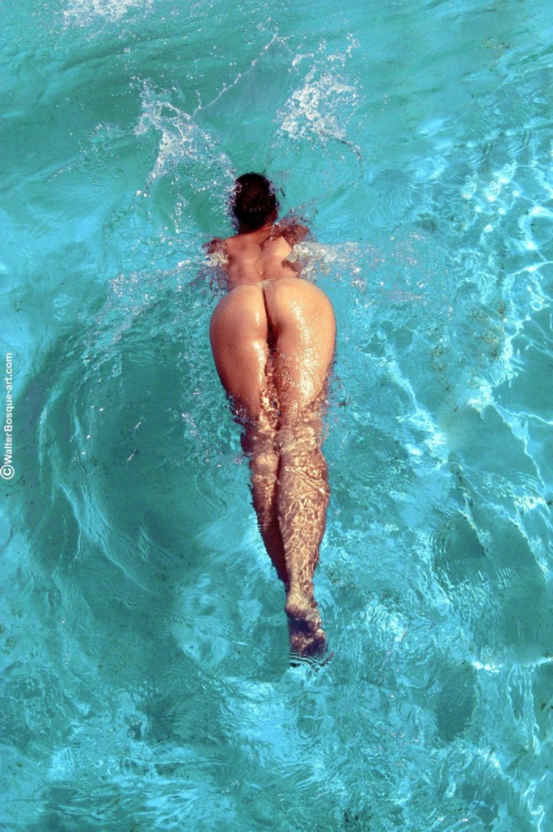 Bathing naked in the pool in the country